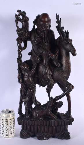 A LARGE 19TH CENTURY CHINESE HARDWOOD SILVER INLAID FIGURE Q...
