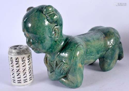 A 19TH CENTURY CHINESE GREEN GLAZED FIGURAL PILLOW Qing. 32 ...