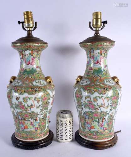 A LARGE PAIR OF 19TH CENTURY CHINESE CANTON FAMILLE ROSE LAM...