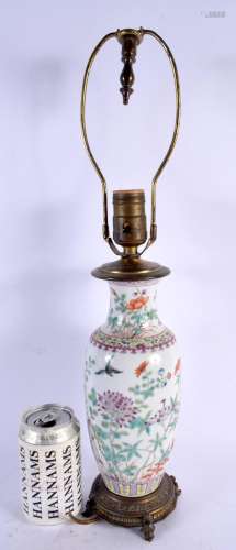 A CHINESE REPUBLICAN PERIOD FAMILLE ROSE LAMP painted with f...