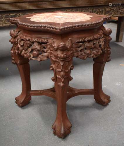 A 19TH CENTURY CHINESE CARVED HARDWOOD MARBLE INSET STAND. 4...