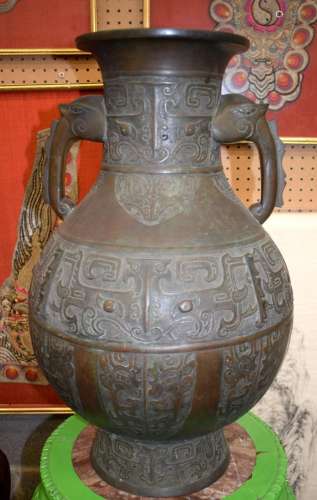A LARGE 19TH CENTURY CHINESE TWIN HANDLED BRONZE VASE Qing. ...