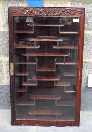A CHINESE REPUBLICAN PERIOD HARDWOOD SNUFF BOTTLE DISPLAY CA...