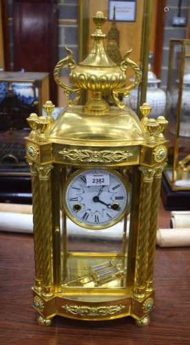 A FRENCH BRONZE AND TURQUOISE MANTEL CLOCK. 56 cm x 20 cm.