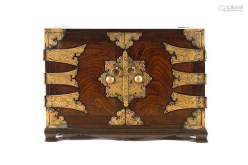 A wooden travel cabinet with copper mounting. Indonesia, aro...