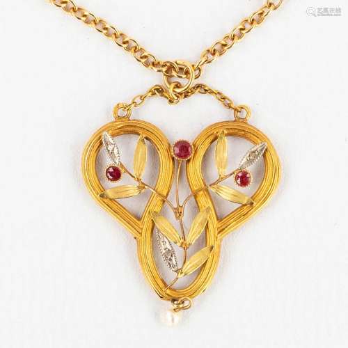 An antique pendant with rubies, brilliant cut stones and a c...