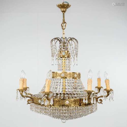 A brass and glass chandelier 'Robe à Perles', finished with ...