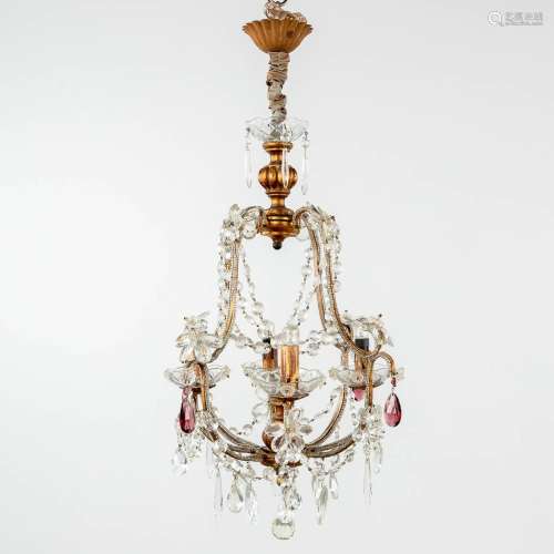 A decorative chandelier, brass and coloured glass. (H: 65 x ...