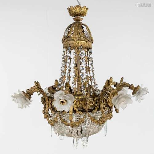 A large chandelier 'Sac à Perles', bronze and glass. Circa 1...