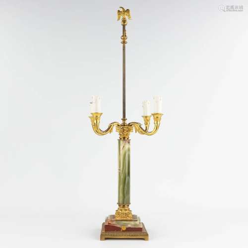 A table lamp, brass and onyx. 20th century. (L: 30 x W: 30 x...