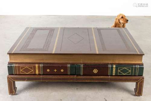 A coffee table in the shape of a large book, circa 1980. (L:...