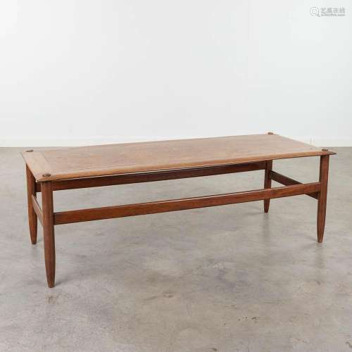 A mid-century coffee table with a reversible top, teak. Circ...