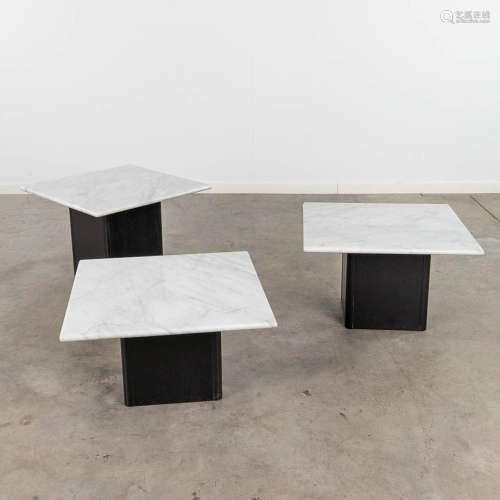 A set of 3 matching coffee tables with different heights, ma...