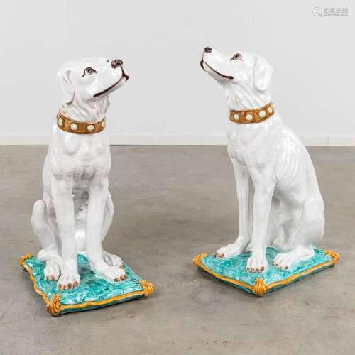 A pair of dogs seated on a pillow, faience, Italy. 20th C. (...