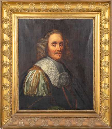 An antique portrait, oil on canvas. Framed in an empire-styl...