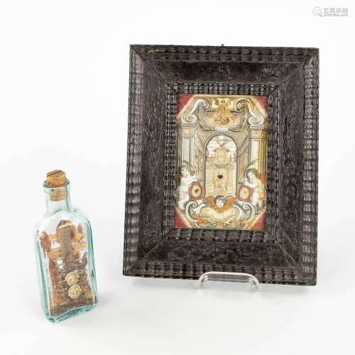A reliquary frame, De Cruce and S. Pignativs, added a bottle...