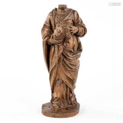 An antique wood sculpture 'Decapitated Saint John The Baptis...
