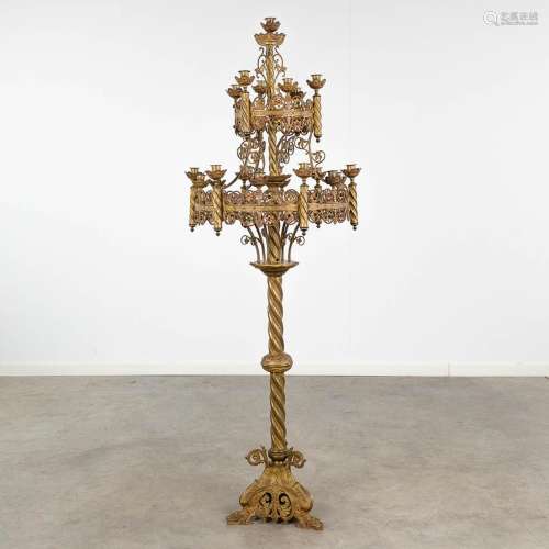A large Church candelabra, bronze in a Gothic Revival style....