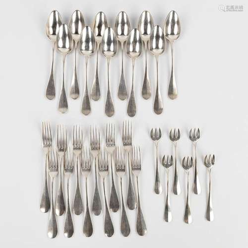 A collection of 29 pieces of silver cutlery. 1060g