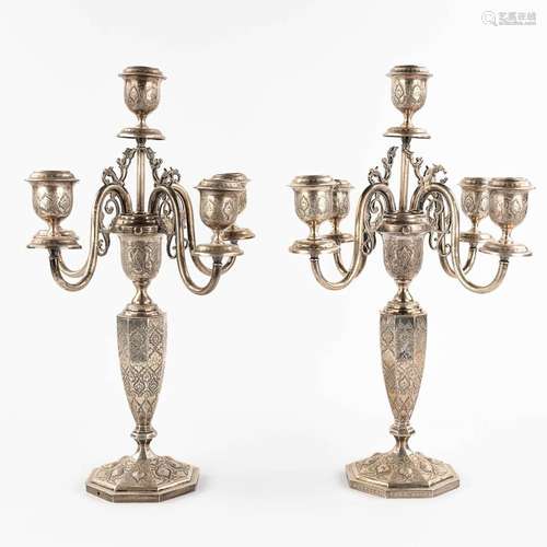 A pair of candelabra, silver, probably Middle-East. 3,650g.