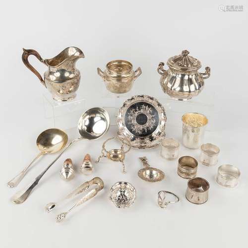 A various collection of silver table accessories and items. ...