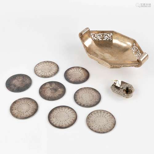 Christofle, a collection of 8 coasters, added a silver bowl....