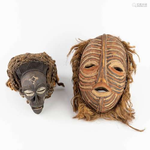 A collection of 2 African masks 'Chokwe' and 'Luba Songye'. ...