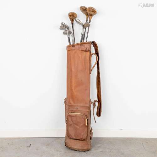 A collection of vintage golf clubs, Brassie Scotland & D...