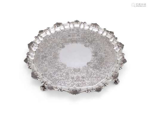 A GEORGE IV SILVER SHAPED CIRCULAR SALVER