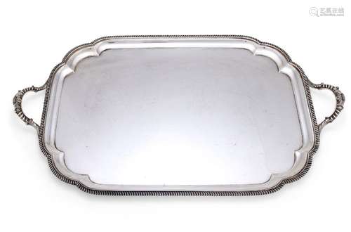 A SILVER SHAPED OBLONG TWIN HANDLED TRAY