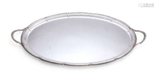 A LATE VICTORIAN SILVER SHAPED OVAL TWIN HANDLED TRAY