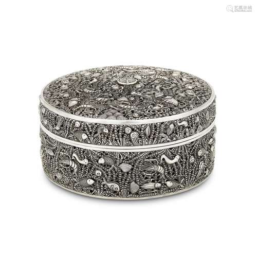 A CHINESE SILVER PIERCED CIRCULAR BOX AND COVER