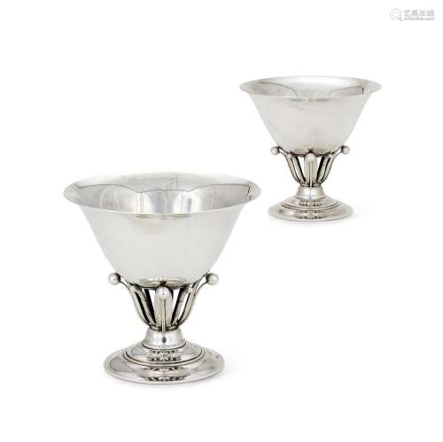 GEORG JENSEN, A PAIR OF DANISH SILVER COLOURED PEDESTAL BOWL...