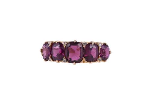 A LATE VICTORIAN GARNET AND DIAMOND POINT FIVE STONE RING, C...