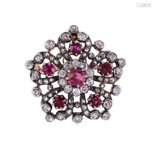 A LATE VICTORIAN RUBY AND DIAMOND FLOWER HEAD BROOCH/PENDANT