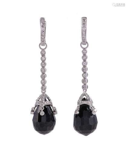 A PAIR OF ONYX AND DIAMOND DROP EARRINGS