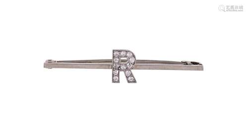 A DIAMOND SET INITIAL BAR BROOCH FIRST HALF OF THE 20TH CENT...