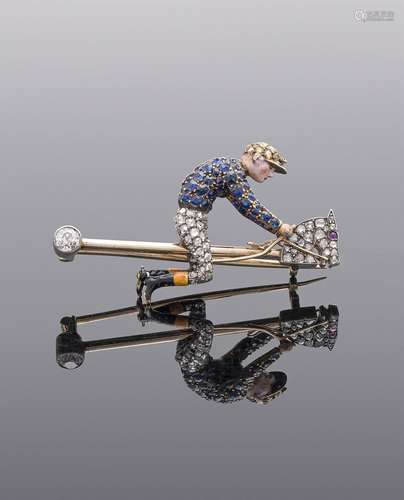 AN EARLY 20TH CENTURY SAPPHIRE, DIAMOND AND ENAMEL JOCKEY AN...