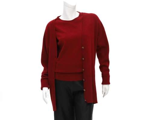 A burgundy red Chanel twin set of a sweater and a cardigan. ...