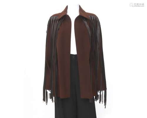 A Hermès coat 100% cashmere in brown colour and leather frin...