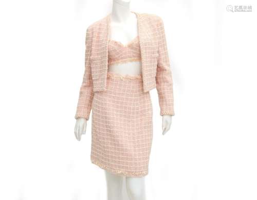 A Chanel Boutique tweed ensemble a white with soft pink bust...
