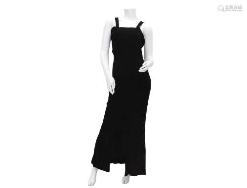 A Chanel Boutique long black dress with crossed shoulder str...
