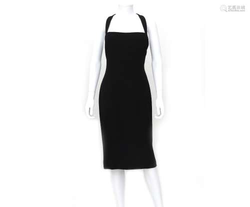 A Chanel Boutique, black bodycon dress with wide shoulder st...