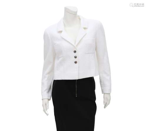 Chanel Boutique white jacket with a quilted pattern. The jac...