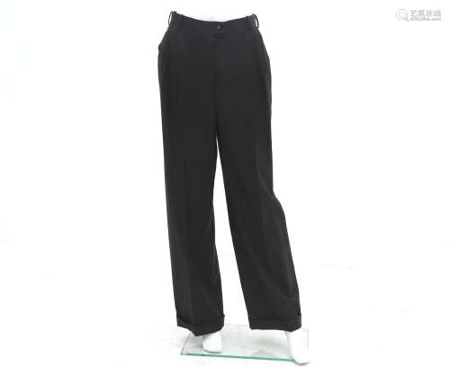 Dark gray Chanel pinstripe trousers. The waist button is bla...