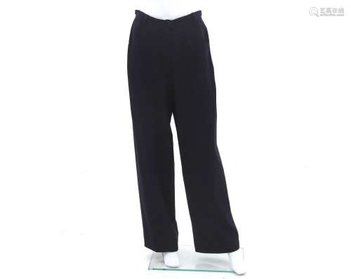 A pair of navy blue Chanel Boutique trousers. Wide legs with...