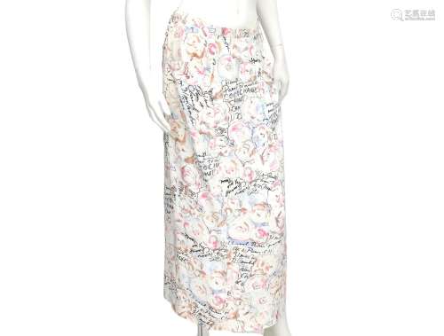 A Chanel Boutique long skirt with all over print. At the fro...