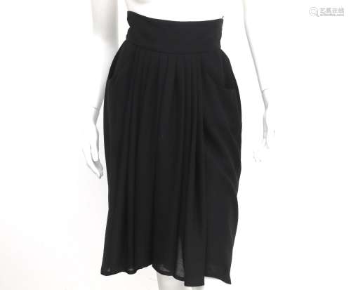 A Chanel Boutique black pleated skirt, the skirt has two poc...