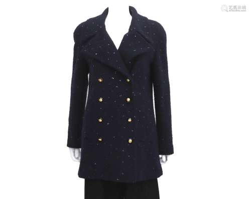 A dark blue Chanel Boutique coat. Incl. fabric sample and bu...