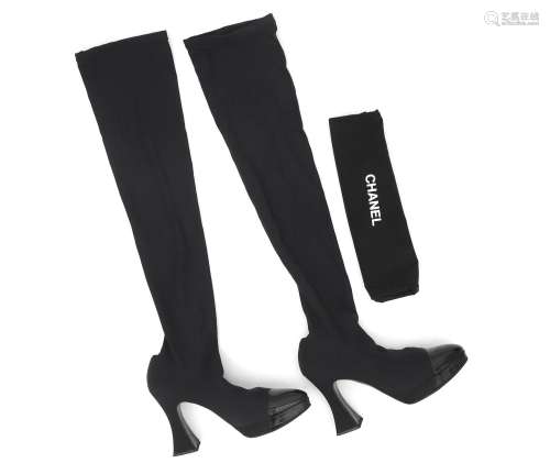 A pair of black Chanel overknee boots, size 38. Stretch favb...